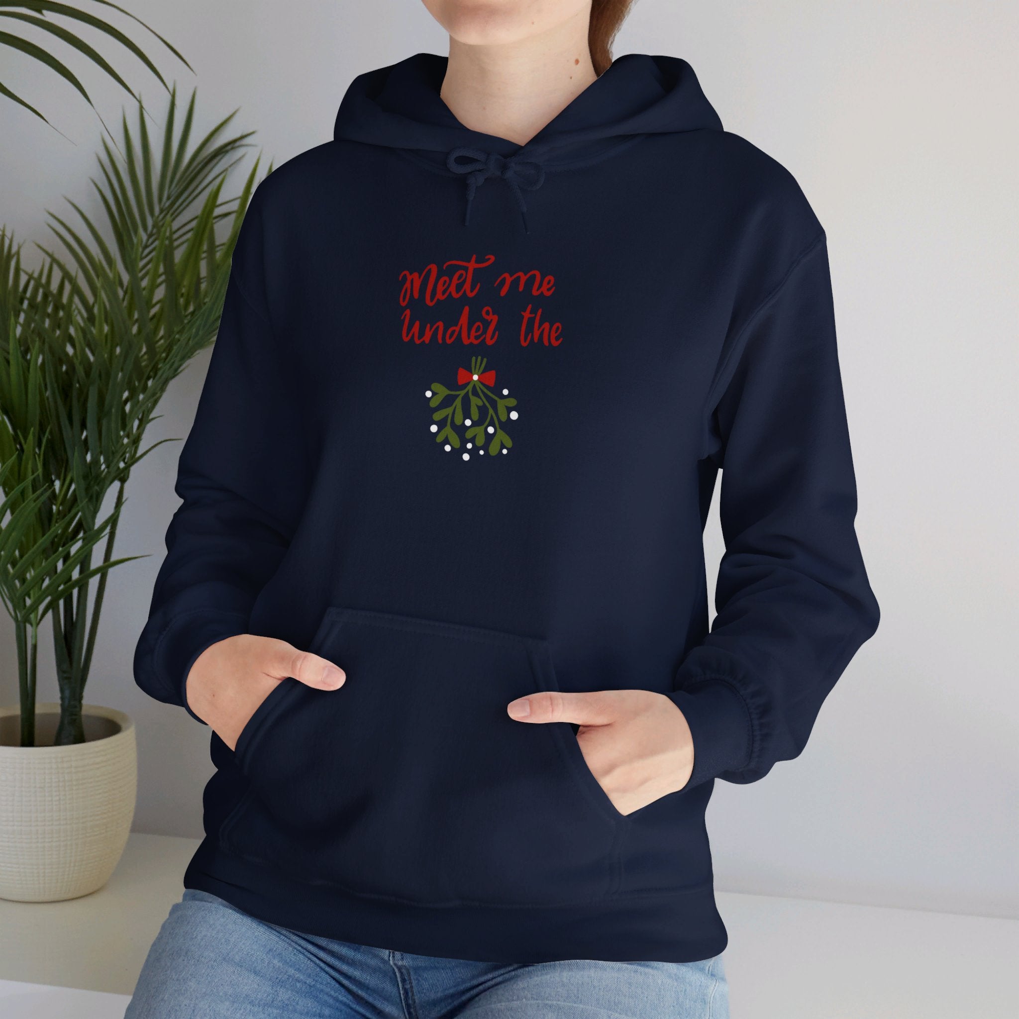 Meet Me Under The Mistletoe Unisex Heavy Blend™ Hooded Sweatshirt